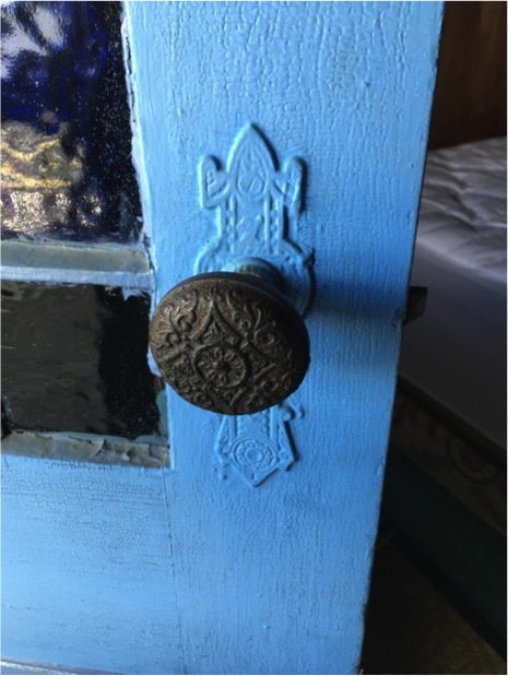 Fig. 5 Nineteenth century door knob and plate, second floor porch door, 9th11th NH Regimental Cottage. 