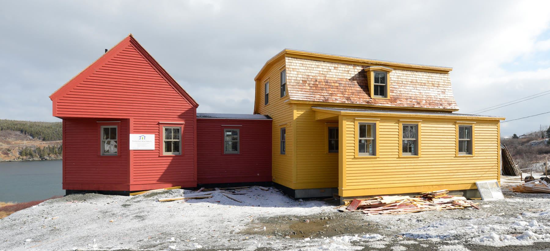 Restoration of the Keough Homestead in Calvert, Newfoundland a new addition for a studiobedroom was added to the east side of the house, painted with the red ochre colour typically used for outbuildings. Photo courtesy of Robert Mellin